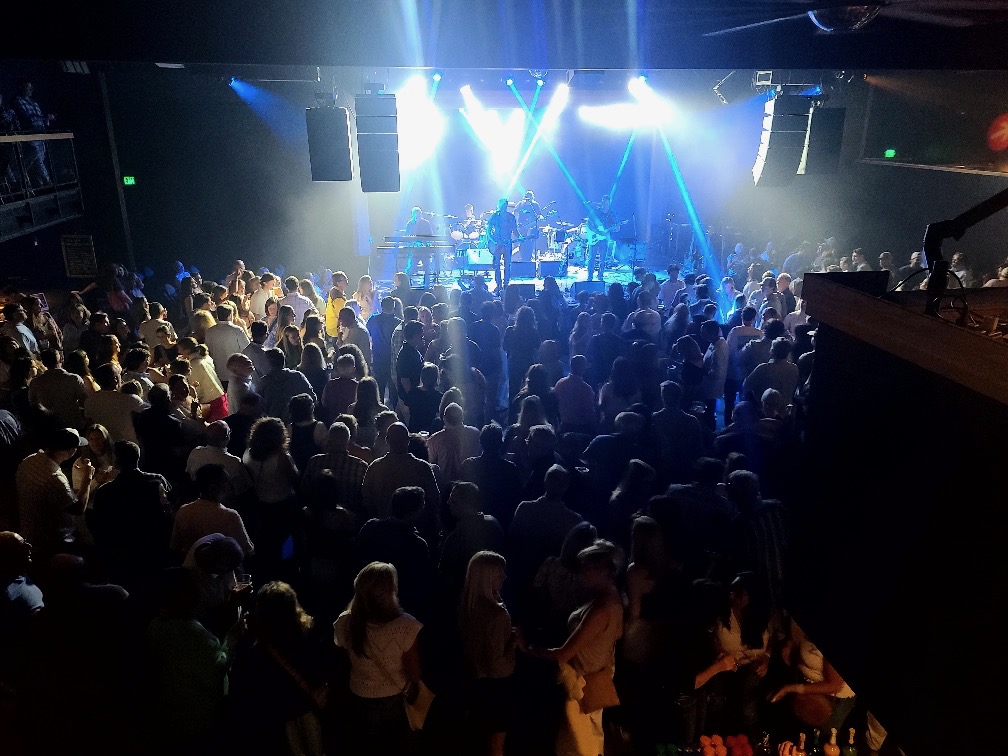 A view from above and behind the crowd watching Ellis Island at FTC